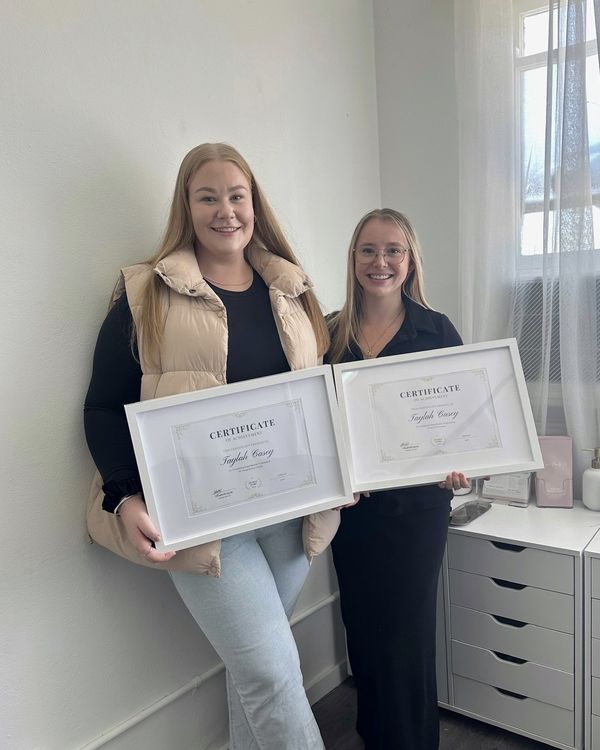 Taylah with her two Regal Beauty Co training certificates