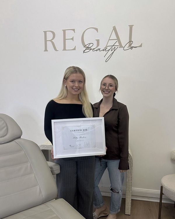 Kitty with her Lash and Brow Mastery certificate